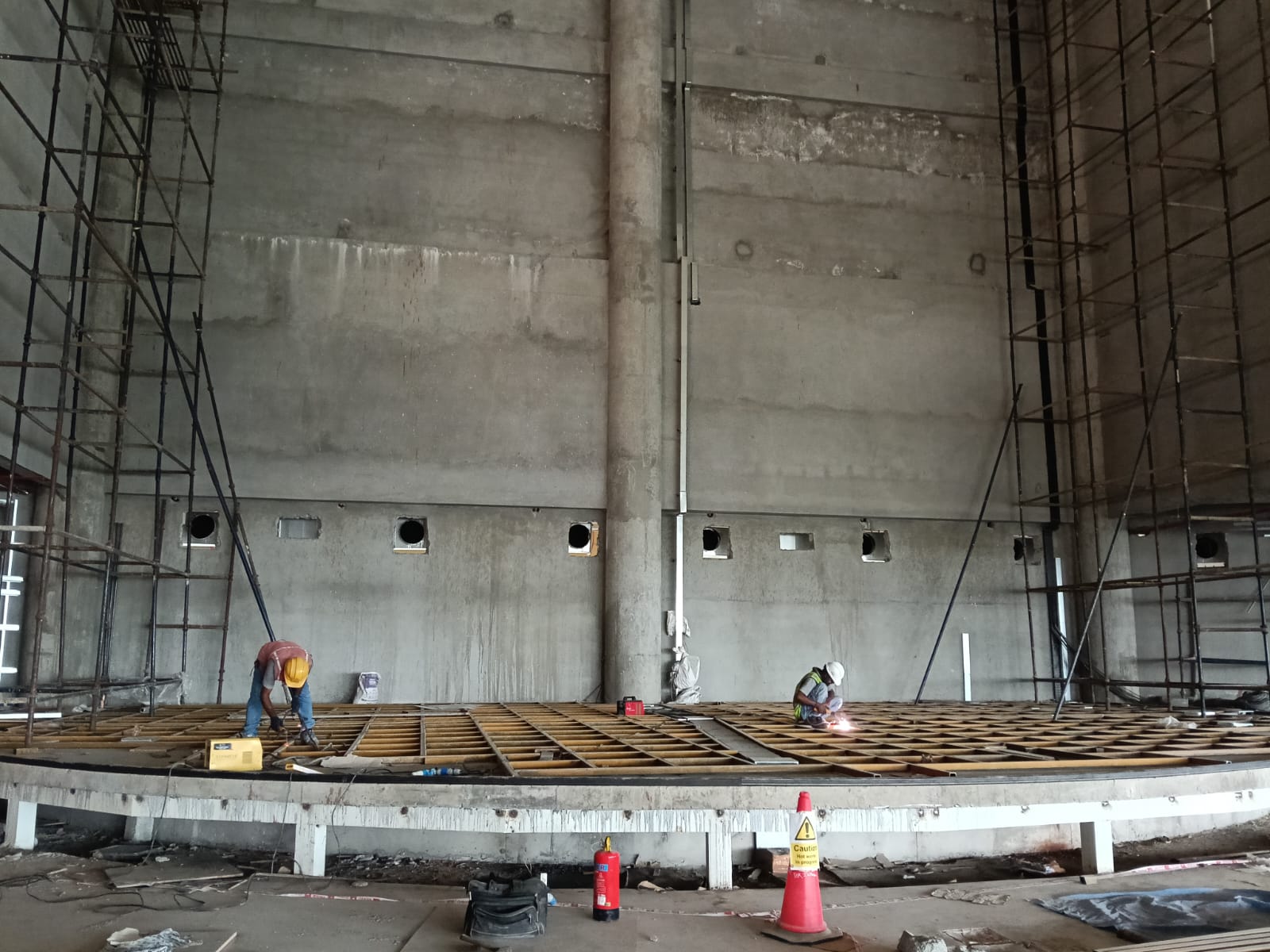 Stage and tall wall area prepared for continued metal framework installation